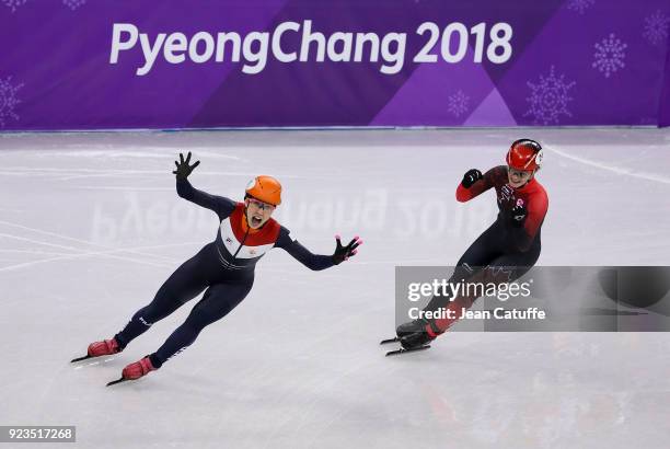 Suzanne Schulting of the Netherlands competes and wins before Kim Boutin of Canada during the Short Track Speed Skating Women's 1000m Final A on day...