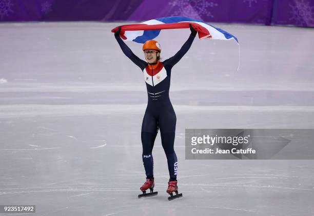 Suzanne Schulting of the Netherlands celebrates her victory following the Short Track Speed Skating Women's 1000m Final A on day thirteen of the...