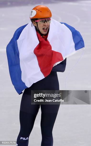 Suzanne Schulting of the Netherlands celebrates her victory following the Short Track Speed Skating Women's 1000m Final A on day thirteen of the...