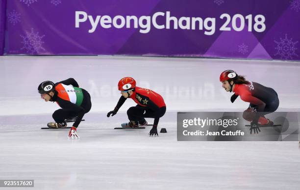 Shaolin Sandor Liu of Hungary , Tianyu Han of China and Samuel Girard of Canada during the Short Track Speed Skating Men's 5000m Relay Final A on day...