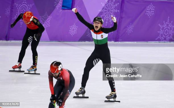 Shaolin Sandor Liu of Hungary wins in front of Tianyu Han of China during the Short Track Speed Skating Men's 5000m Relay Final A on day thirteen of...