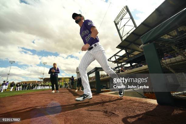 Colorado Rockies left fielder David Dahl heads out of the dugout for team introductions during opening day against the Arizona Diamondbacks on...