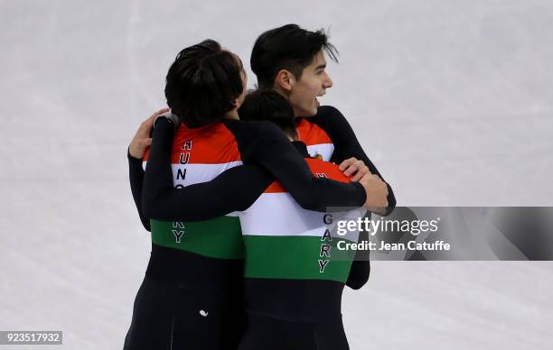 Shaolin Sandor Liu, Shaoang Liu and Viktor Knoch of Hungary celebrate victory following the Short Track Speed Skating Men's 5000m Relay Final A on...