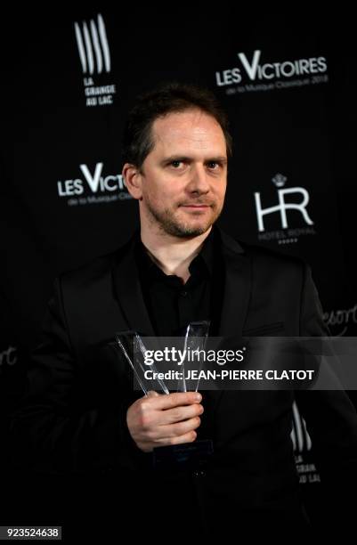 French composer Karol Beffa poses after receiving an award at the "Victoire de la musique classique" award ceremony at The Grange au Lac Auditorium...
