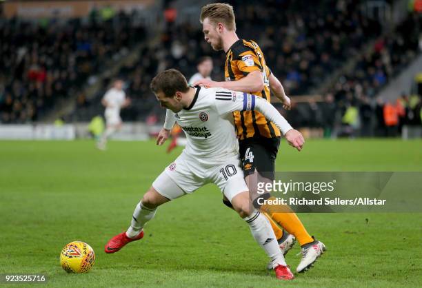 Sheffield United's Billy Sharp and Hull City's Max Clark during the Sky Bet Championship match between Hull City and Sheffield United at KCOM on...