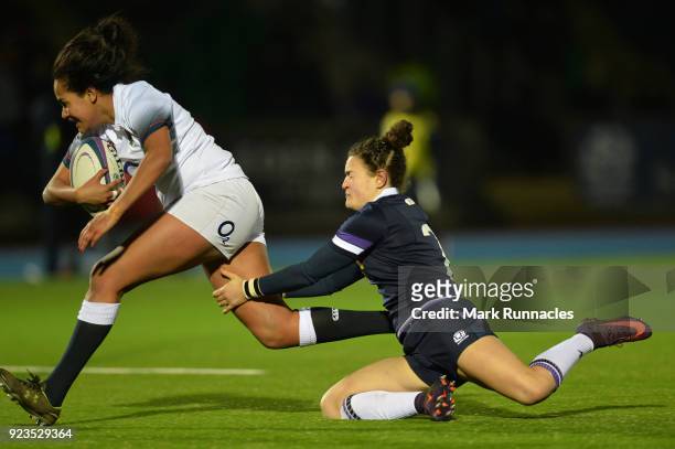 Lagi Tuima of England avoids a tackle by Louise McMillan of Scotland to score a try in the second half during the Natwest Women's Six Nations match...