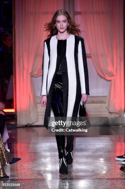 Model walks the runway at the Genny Autumn Winter 2018 fashion show during Milan Fashion Week on February 22, 2018 in Milan, Italy.