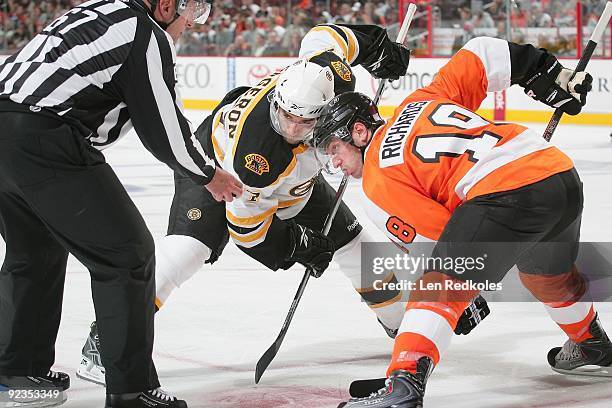Mike Richards of the Philadelphia Flyers and Patrice Bergeron of the Boston Bruins both ready for a face-off on October 22, 2009 at the Wachovia...