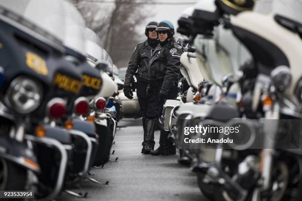 Motorcycle Officers wait to escort the funeral procession for slain Prince Georges County Police Officer Mujahid Ramzziddin at the Diyanet Center of...