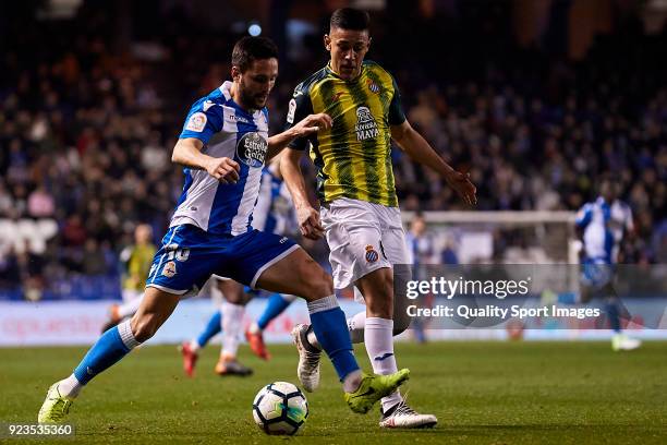 Florin Andone of Deportivo de La Coruna is challenged by Oscar Duarte of RCD Espanyol during the La Liga match between Deportivo La Coruna and...