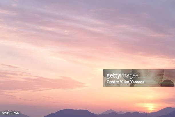 cloud typologies - romantic sky at twilight - sunset sky stockfoto's en -beelden