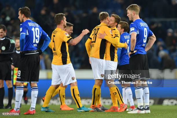 Manuel Prietl and Fabian Klos of Bielefeld look dejected while players of Dresden celebrate after the Second Bundesliga match between DSC Arminia...