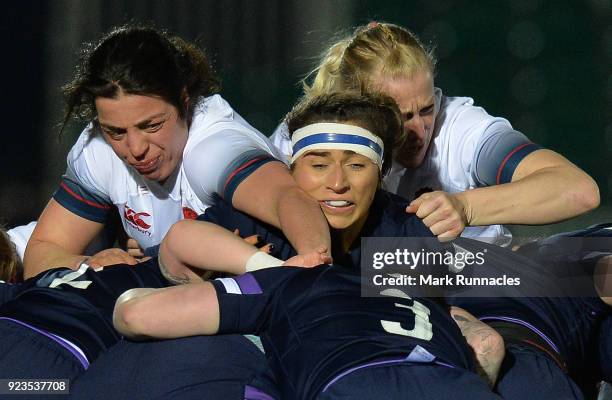 Tamara Talyor , and Rowena Burnfield , of England tackle Emma Wassell , of Scotland during the Natwest Women's Six Nations match between Scotland...