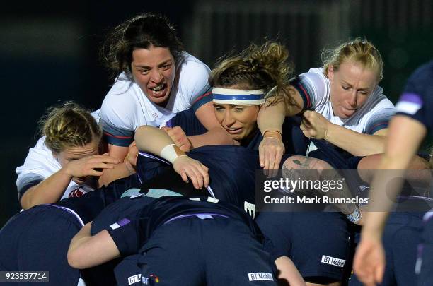 Tamara Talyor , and Rowena Burnfield , of England tackle Emma Wassell , of Scotland during the Natwest Women's Six Nations match between Scotland...