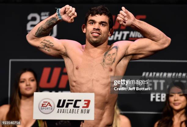 Renan Barao of Brazil poses on the scale during the UFC Fight Night Weigh-in at Amway Center on February 23, 2018 in Orlando, Florida.