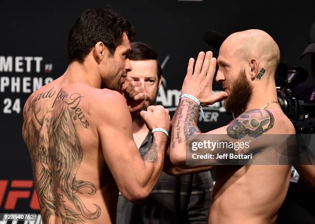 Opponents Renan Barao of Brazil and Brian Kelleher face off during the UFC Fight Night Weigh-in at Amway Center on February 23, 2018 in Orlando,...