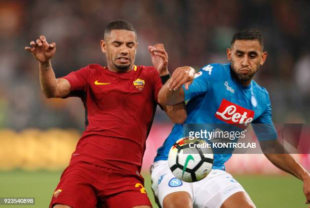 Napoli's Algerian defender Faouzi Ghoulam fights for the ball with Roma's French midfielder Maxime Gonalons during theItalian Serie A football match...