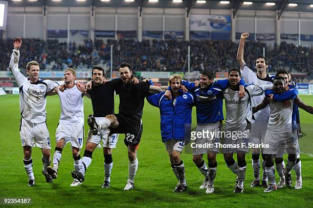 Players of Bielefeld celebrate their victory after the Second Bundesliga match between SC Paderborn and Arminia Bielefeld at Energieteam Arena on...