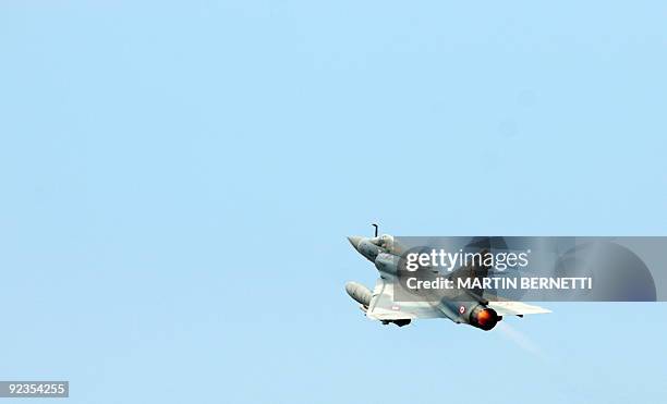 French Mirage 2000C fighter jet takes part in a war games exercise in Antofagasta, some 1300 km north of Santiago, on October 26,2009. Salitre II is...