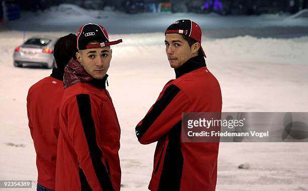 Karim Benzema and Cristiano Ronaldo looks on during the Audi Car Handover and Snow Driving Experience with Real Madrid at the Snowzone on October 26,...