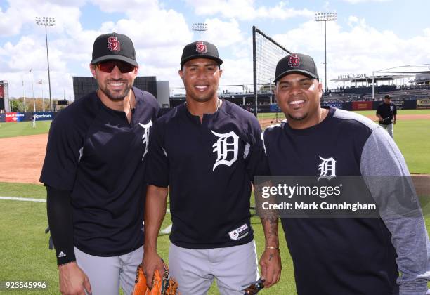 Nicholas Castellanos, Leonys Martin and Brayan Pena of the Detroit Tigers pose for a photo while wearing special SD logo baseball hats to honor the...