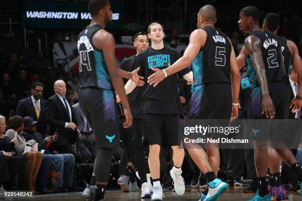 Cody Zeller of the Charlotte Hornets with his teammates huddle before the game against the Washington Wizards on February 23, 2018 at Capital One...
