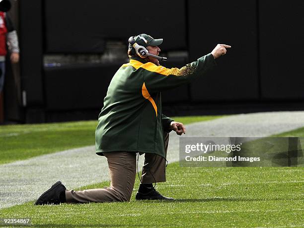 Assistant coach Kevin Greene of the Green Bay Packers yells instructions to the defense during a game on October 25, 2009 against the Cleveland...