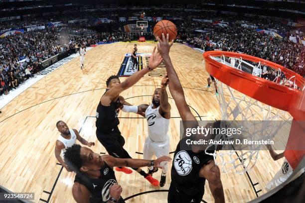 Giannis Antetokounmpo and Joel Embiid of team Stephen block the shot by LeBron James of team LeBron during the NBA All-Star Game as a part of 2018...