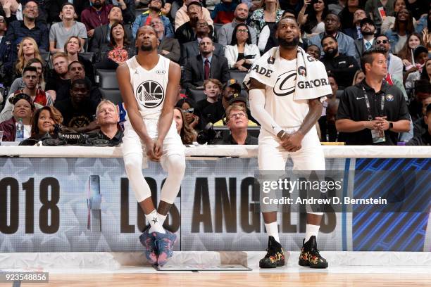 Kevin Durant and LeBron James of team LeBron look on during the NBA All-Star Game as a part of 2018 NBA All-Star Weekend at STAPLES Center on...