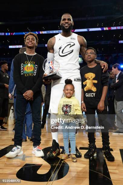 LeBron James stands with his MVP trophy after the NBA All-Star Game as a part of 2018 NBA All-Star Weekend at STAPLES Center on February 18, 2018 in...