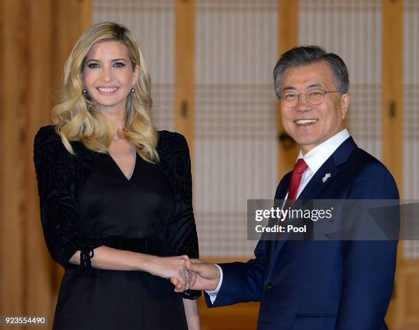 South Korean President Moon Jae-In shakes hands with Ivanka Trump during their dinner at the Presidential Blue House on February 23, 2018 in Seoul,...