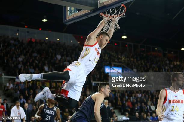 Andrey Zuubkov 12 of Russia and Paul Lacombe 90 of France during FIBA Basketball World Cup 2019 qualifier match between France and Russia at the...