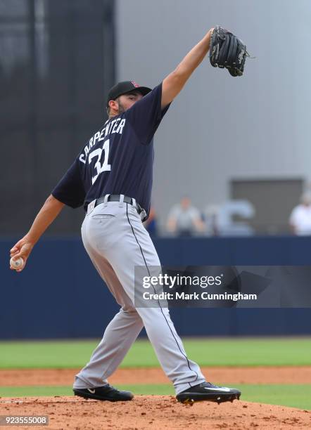 Ryan Carpenter of the Detroit Tigers pitches while wearing a special SD logo baseball hat to honor the Marjory Stoneman Douglas High School shooting...