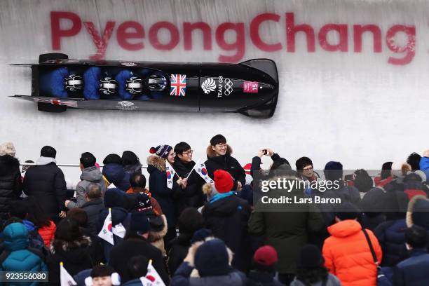 Lamin Deen, Ben Simons, Toby Olubi and Andrew Matthews of Great Britain compete during 4-man Bobsleigh Heats on day fifteen of the PyeongChang 2018...