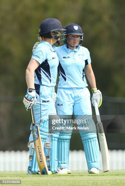 Alyssa Healy congratulates Alex Blackwell after Blackwell hit a boundary during the WNCL Final match between New South Wales and Western Australia at...