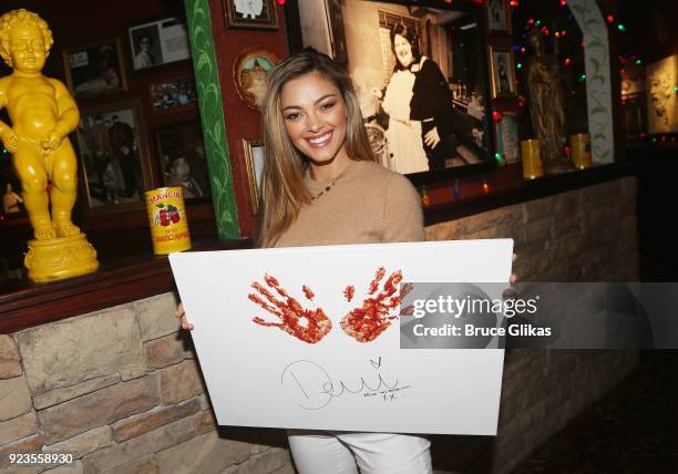 Miss Universe 2017 Demi-Leigh Nel-Peters visits Buca di Beppo Times Square on February 22, 2018 in New York City.