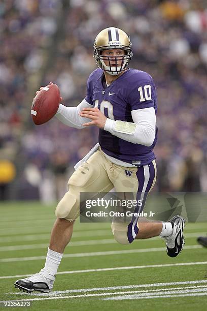 Quarterback Jake Locker of the Washington Huskies looks to pass the ball during the game against the Oregon Ducks on October 24, 2009 at Husky...