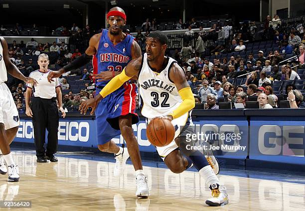Mayo of the Memphis Grizzlies drives to the basket against Richard Hamilton of the Detroit Pistons during a preseason game at the FedExForum on...