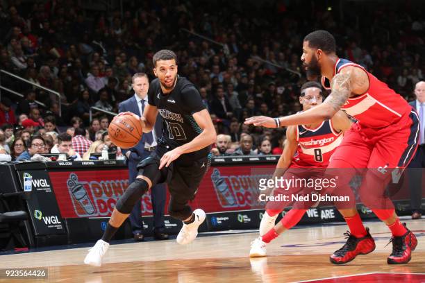 Michael Carter-Williams of the Charlotte Hornets handles the ball against the Washington Wizards on February 23, 2018 at Capital One Arena in...