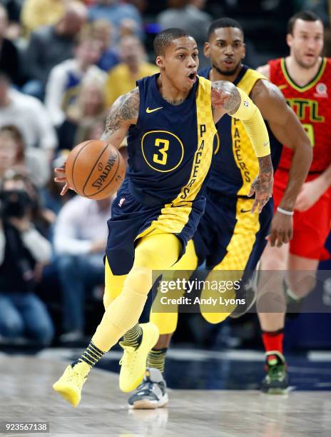 Joe Young of the Indiana Pacers dribbles the ball against the Atlanta Hawks during the game at Bankers Life Fieldhouse on February 23, 2018 in...