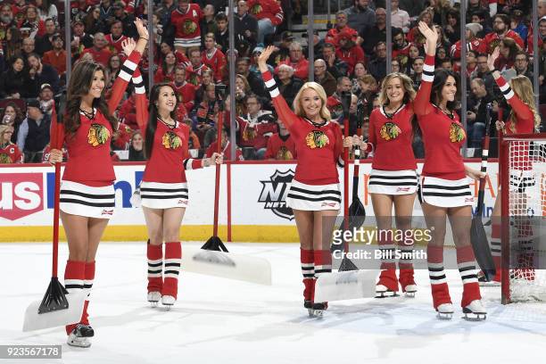The Chicago Blackhawks ice-crew wave to the crowd in during the game between the Chicago Blackhawks and the San Jose Sharks at the United Center on...