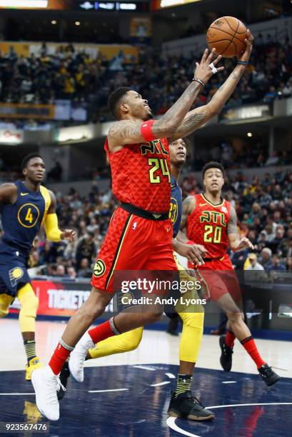 Kent Bazemore#24 of the Atlanta Hawks shoots the ball against the Indiana Pacers during the game at Bankers Life Fieldhouse on February 23, 2018 in...