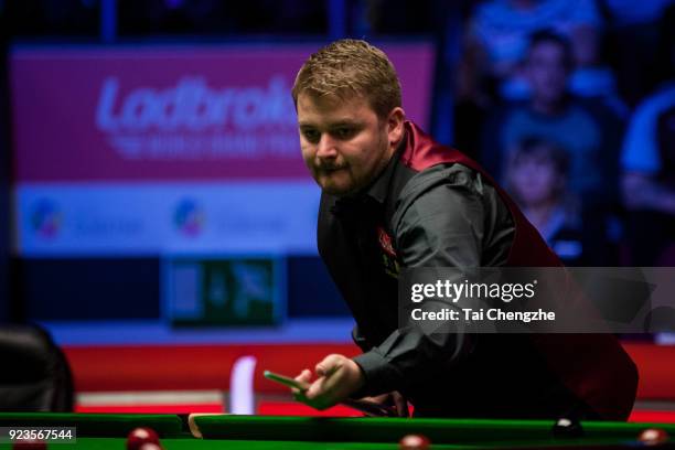 Michael White of Wales plays a shot during his quarter-final round match against Mark Selby of England on day five of 2018 Ladbrokes World Grand Prix...