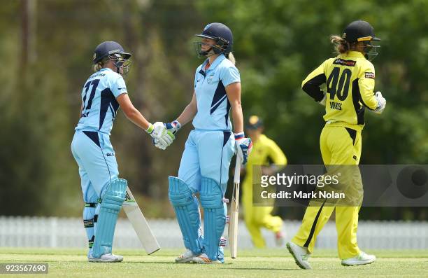 Ellyse Perry of NSW is congratulated after scoring a half century during the WNCL Final match between New South Wales and Western Australia at...