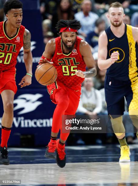 DeAndre Bembry of the Atlanta Hawks dribbles the ball against the Indiana Pacers during the game at Bankers Life Fieldhouse on February 23, 2018 in...