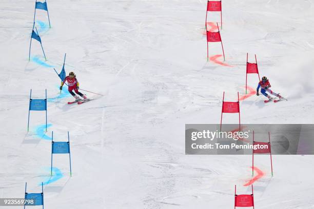 Laurence St.Germain of Canada and Adeline Baud Mugnier of France compete during the Alpine Team Event 1/8 Finals on day 15 of the PyeongChang 2018...