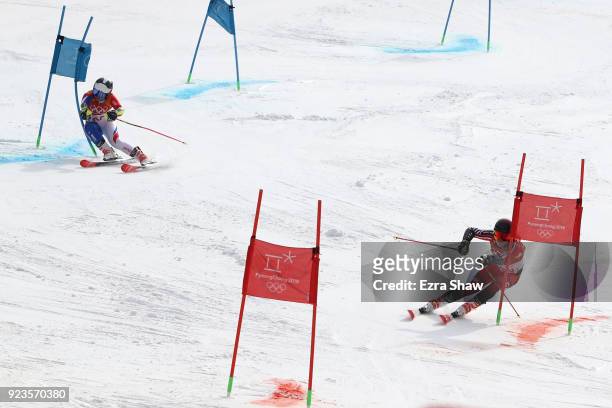 Tessa Worley of France and Erin Mielzynski of Canada compete during the Alpine Team Event 1/8 Finals on day 15 of the PyeongChang 2018 Winter Olympic...