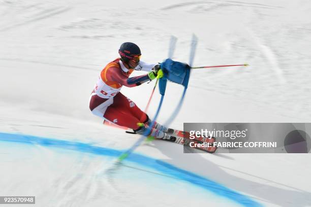 Switzerland's Ramon Zenhaeusern competes in the Alpine Skiing Team Event 1/8 finals at the Jeongseon Alpine Center during the Pyeongchang 2018 Winter...