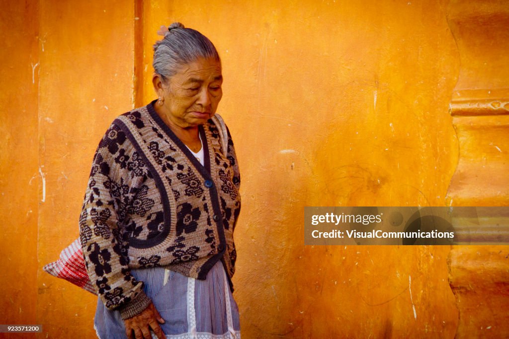 Older Mayan woman in streets of Antigua, Guatemala.