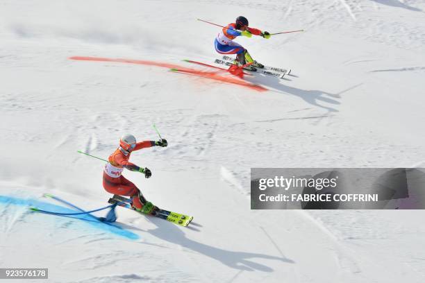 Norway's Sebastian Foss-Solevaag and France's Alexis Pinturault compete in the Alpine Skiing Team Event small final at the Jeongseon Alpine Center...